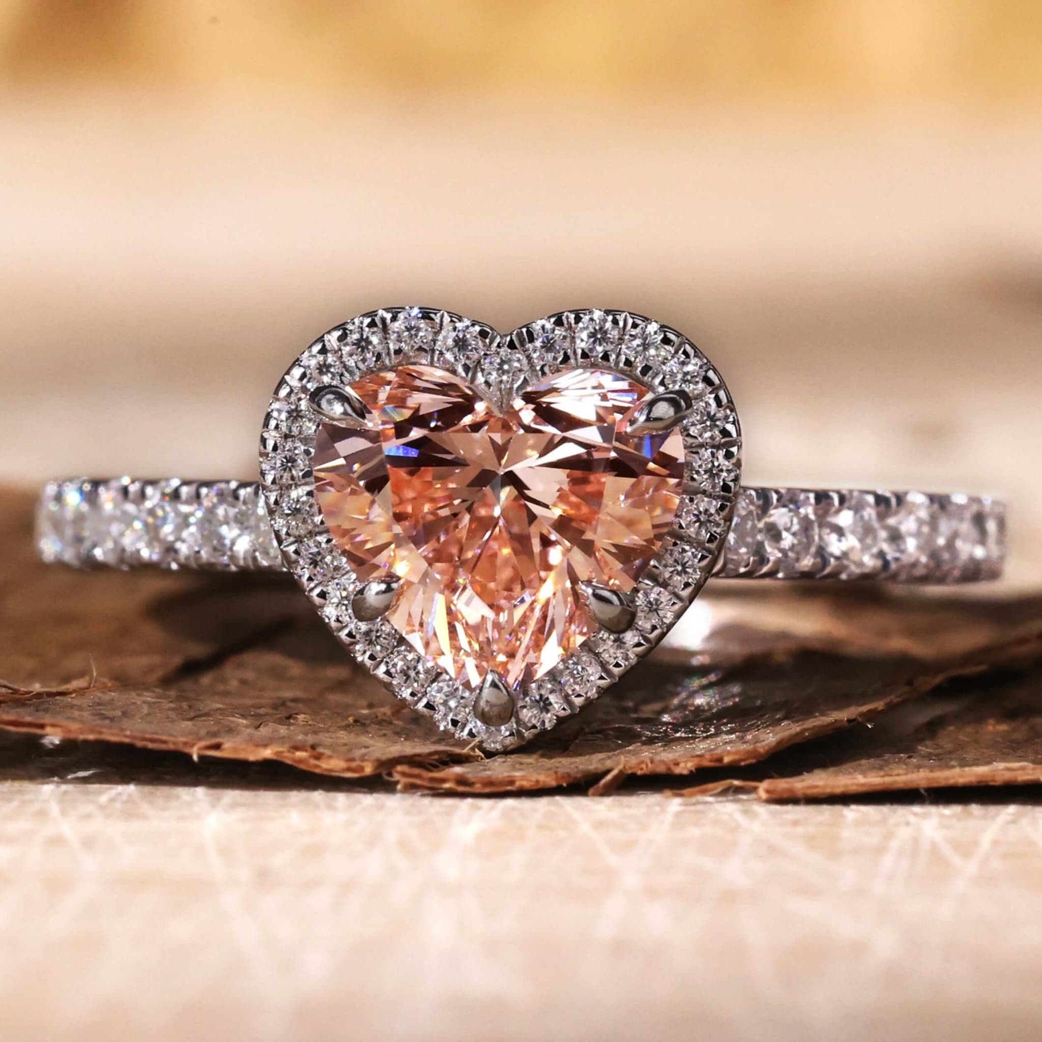 Heart-shaped pink halo ring designed with the free online ring designer